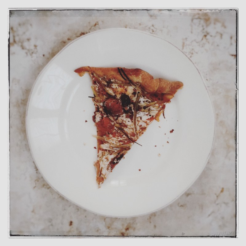 Red sauce. Pork sausage. Mozzarella. Black olives. Scallions. Shaved garlic. Parmesan.